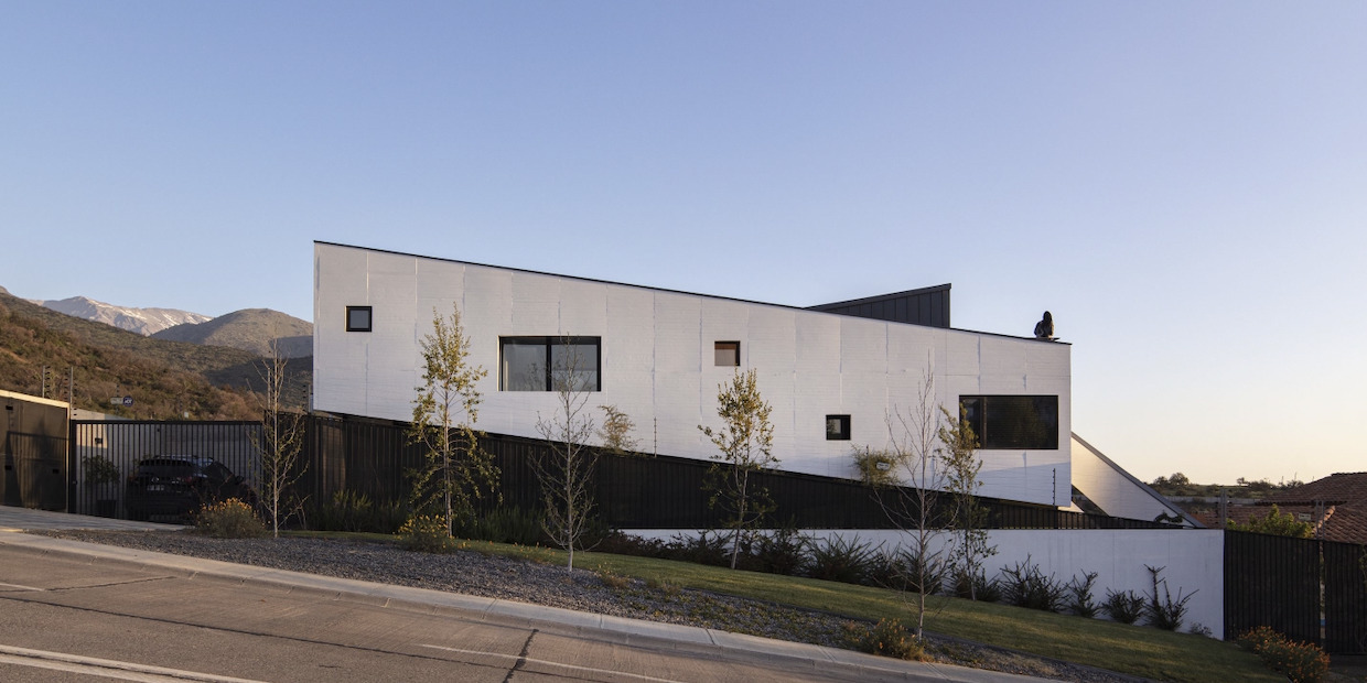 sloped to fit 14 homes that embrace the hill as a catalyst for their design - 25051